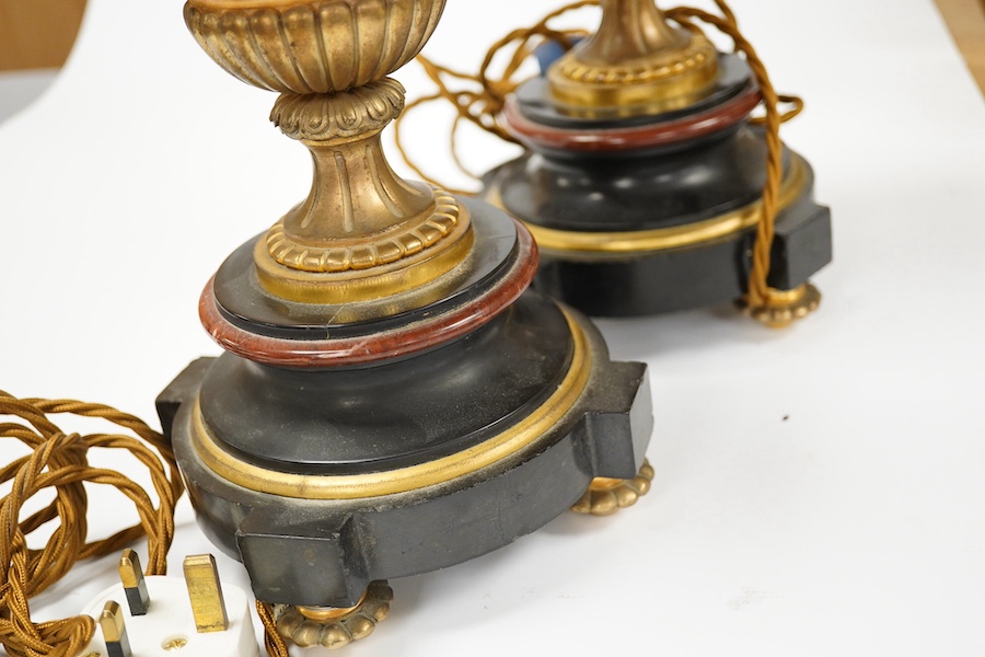 A pair of ormolu, rouge and black marble table lamps, 42cm including fitting. Condition - good